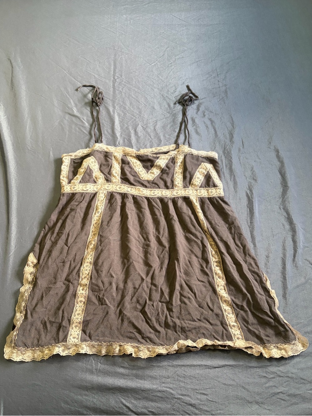 Brown&cream lace trim free people  babydoll top w/tie straps.Most likely size XL